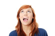 Surprised young woman looking up