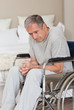 Thoughtful senior man in his wheelchair