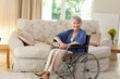 Retired woman in her wheelchair Retired woman in her wheelchair
