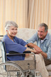 Senior couple talking in the living room at home Senior couple talking in the living room at home