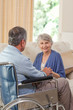 Senior couple talking in the living room at home Senior couple talking in the living room at home