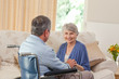 Senior couple talking in the living room at home Senior couple talking in the living room at home