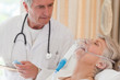 Foto: Doctor examining his patient Doctor examining his patient