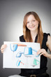 Young Design Engineer Woman Shows a Design Plan Young Design Engineer Woman Shows a Design Plan