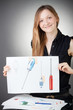 Young Design Engineer Woman Shows a Design Plan Young Design Engineer Woman Shows a Design Plan
