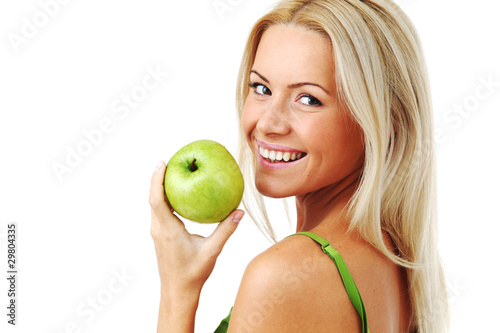 Photo: woman eat green apple woman eat green apple