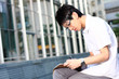 chinese man studing outdoor