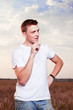 A man standing in field of wheat