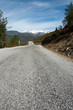 Long empty road to the hills