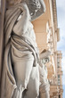 Neoclassical atlantes at the entrance to a house near Vienna's p