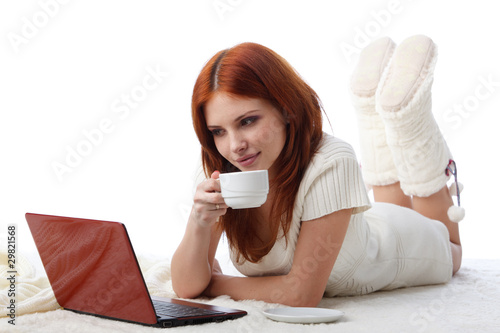 Photo: .Young woman with a laptop. .Young woman with a laptop.