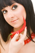 cute girl with chili pepper