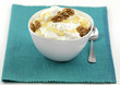 a bowl of yogurt with honey and walnuts a bowl of yogurt with honey and walnuts