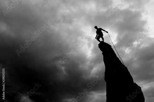 Photo: Climber on the summit. Climber on the summit.