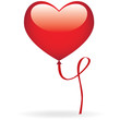 Un ballon en forme de coeur flottant dans les airs