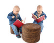 Baby twins reading book
