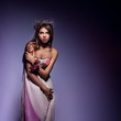 Fashion portrait of beautiful model wearing a long dress Fashion portrait of beautiful model wearing a long dress