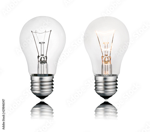 Photo: Two Lightbulbs On and Off with Reflection Isolated Two Lightbulbs On and Off with Reflection Isolated