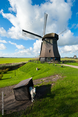 Photo: beautiful windmill landscape in the Netherlands beautiful windmill landscape in the Netherlands
