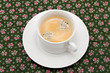 the cup of coffee on the table