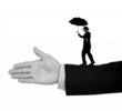 Business man balancing on arm