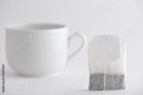 Photo: Tea bag and cup Tea bag and cup