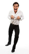 Photo: Frustrated business man tearing apart his shirt Frustrated business man tearing apart his shirt