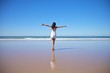 happy white dress woman at Castilnovo beach