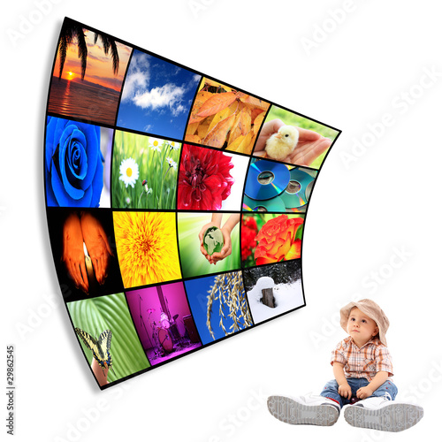 Photo: Cute child with big Tv Cute child with big Tv