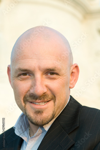 Photo: Smiling Caucasian Man Shaved Head Goatee Isolated Smiling Caucasian Man Shaved Head Goatee Isolated