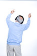 Back of a senior man listening to the music;
