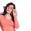 Closeup portrait of young woman thinking with eyes looking up