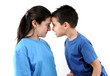 Photo: Cute boy and teen girl shouting each other head to head. Cute boy and teen girl shouting each other head to head.