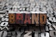 Photo: The word 'Brand' spelled out in very old letterpress blocks. The word 'Brand' spelled out in very old letterpress blocks.