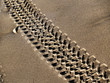 Tyre marked in the sand Tyre marked in the sand