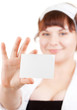 Bright picture of lovely nurse with white blank in her hand
