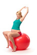 Beautiful pregnant woman using gym ball