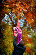 little girl in the autumn park