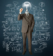 businessman with lamp-head and marker