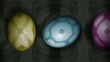 Rolling Eggs on Black Paper