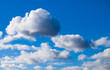 Blue sky with white fluffy clouds Blue sky with white fluffy clouds