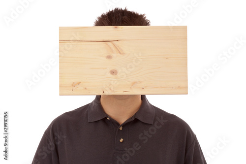 Foto: Mann mit Denkblockade - Brett vorm Kopf Mann mit Denkblockade - Brett vorm Kopf