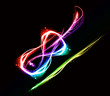 Abstract image of a violin on black background.