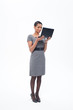 Businesswoman holding laptop