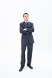 Photo: Businessman with arms crossed thinking Businessman with arms crossed thinking