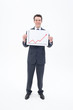 Smiling businessman holding ascending line chart
