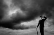 Stormy sky and businessman