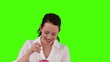 Brunette woman very pleased to open a gift