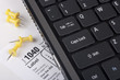Laptop with a form 1040 Laptop with a form 1040