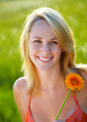 Happy 20s girl with flower